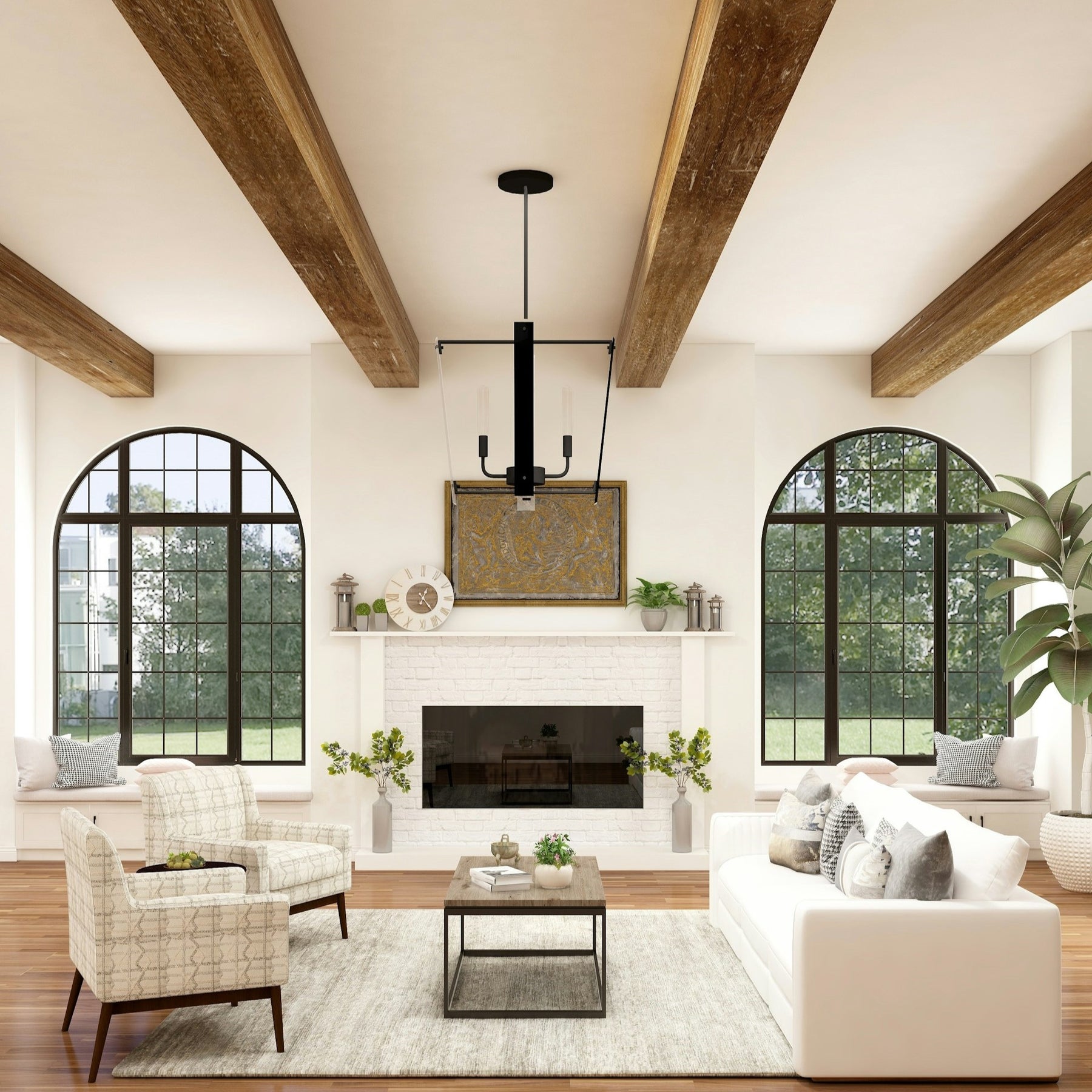 Farmhouse living room featuring a charming chandelier/pendant light illuminating a cozy seating area with a sofa and chairs around a small table. The rustic decor and warm lighting create a welcoming atmosphere perfect for relaxing and entertaining.