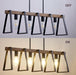 Farmhouse 4-Light Linear Chandelier - Black & Warm Oak Wood.